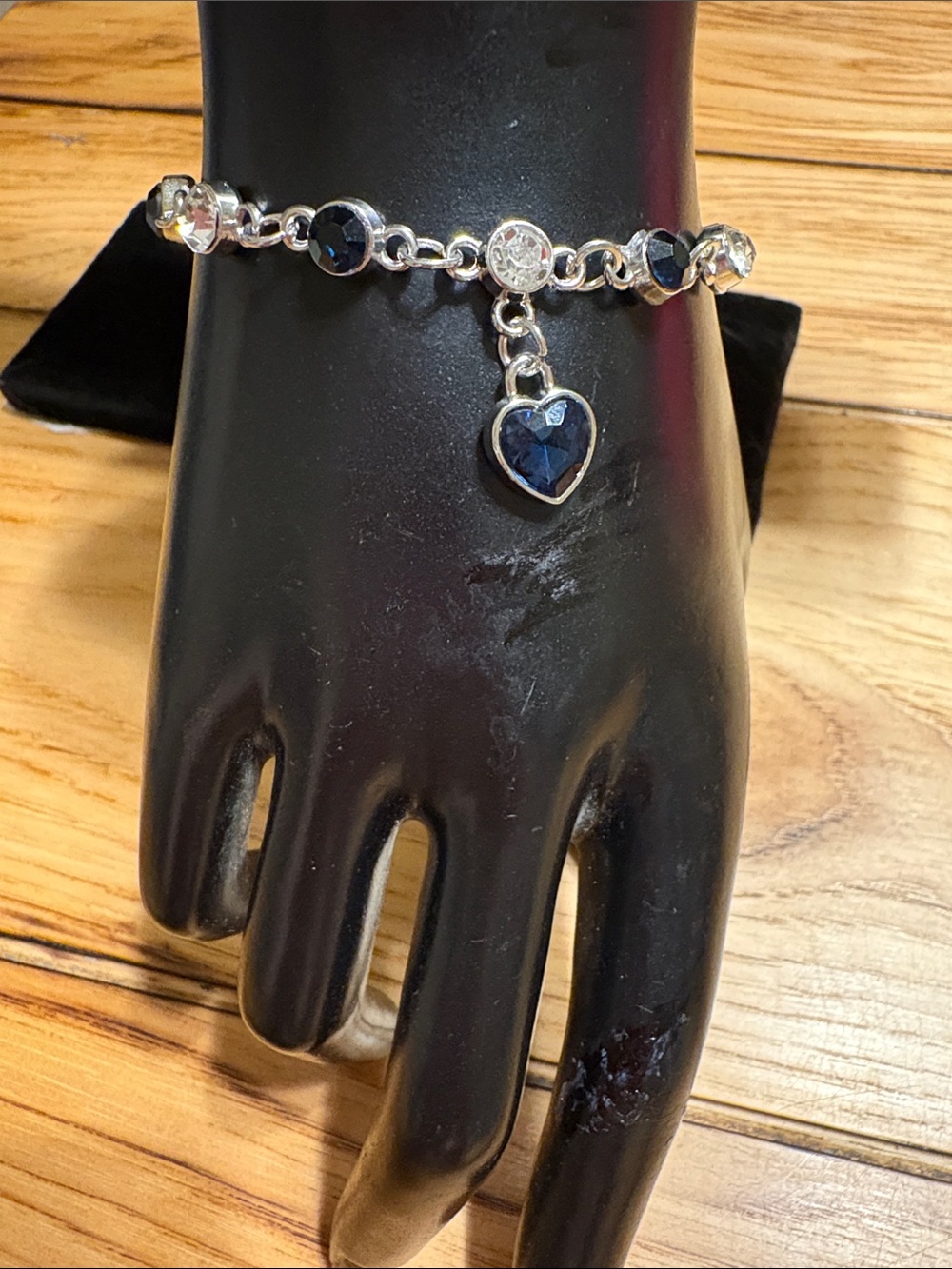 Silver Heart Charm Bracelet with Blue Heart Accent